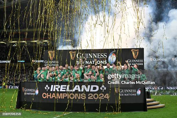 Peter O'Mahony of Ireland lifts the Six Nations Trophy following the team's victory during the Guinness Six Nations 2024 match between Ireland and...