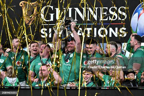 Peter O'Mahony of Ireland lifts the Six Nations Trophy following the team's victory during the Guinness Six Nations 2024 match between Ireland and...