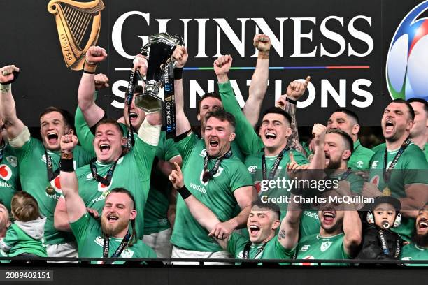Peter O'Mahony of Ireland lifts the Six Nations Trophy following the team's victory during the Guinness Six Nations 2024 match between Ireland and...