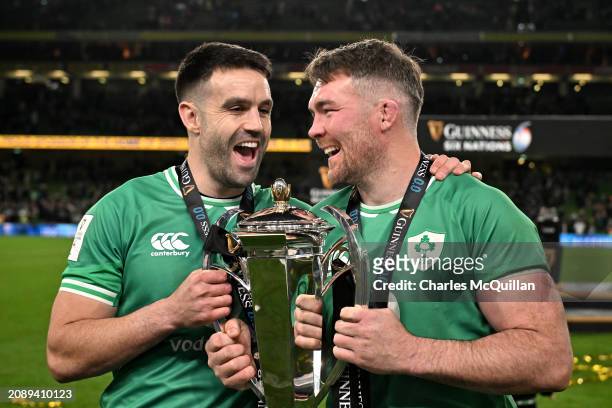 Conor Murray and Peter O'Mahony of Ireland pose for a photo with the Six Nations Trophy following the team's victory during the Guinness Six Nations...
