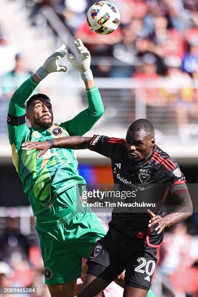 Goalkeeper Drake Callender of Inter Miami makes a save in front of Christian Benteke of D.C. United during the second half at Audi Field on March 16,...