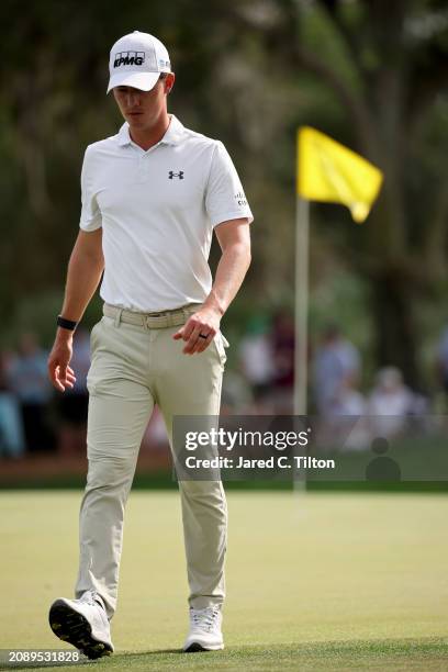 Maverick McNealy of the United States walks off the ninth green during the third round of THE PLAYERS Championship at TPC Sawgrass on March 16, 2024...