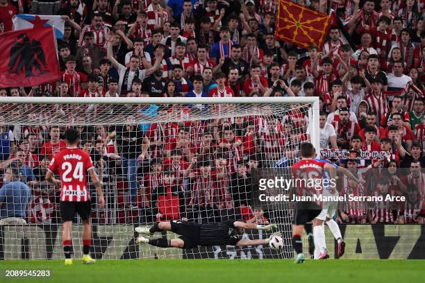 Unai Simon of Athletic Club saves a penalty from Luis Rioja of Deportivo Alaves during the LaLiga EA Sports match between Athletic Bilbao and...