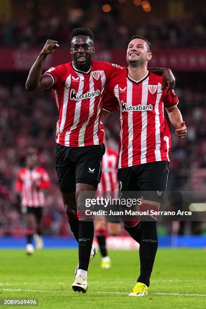 Gorka Guruzeta of Athletic Club celebrates scoring his team's second goal with teammate Inaki Williams of Athletic Club during the LaLiga EA Sports...