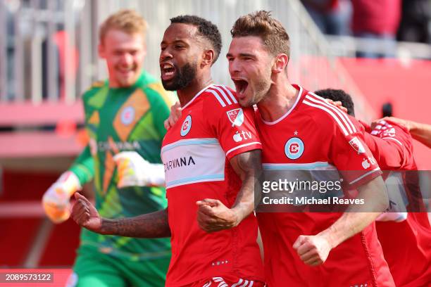 Kellyn Acosta of Chicago Fire FC celebrates after scoring the game-winning goal against the CF Montréal in stoppage time of the second half at...