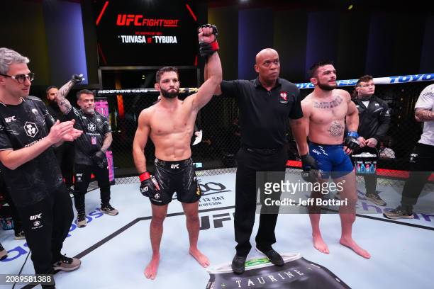 Thiago Moises of Brazil reacts after his victory over Mitch Ramirez in their lightweight fight during the UFC Fight Night event at UFC APEX on March...
