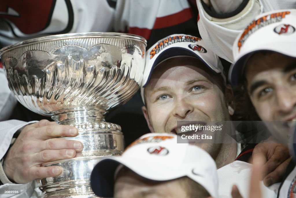 Martin Brodeur poses with the cup