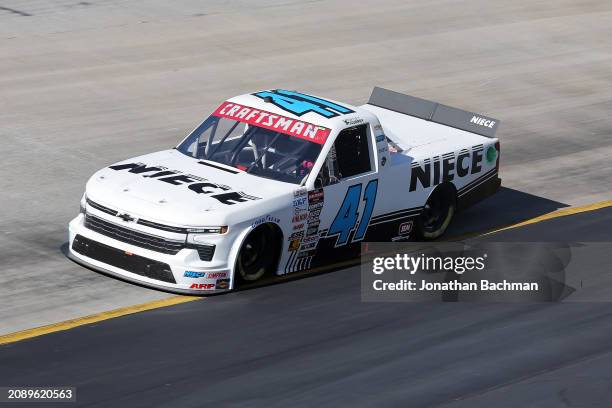 Bayley Currey, driver of the Niece Chevrolet, drives during qualifying for the NASCAR Craftsman Truck Series Weather Guard Truck Race at Bristol...