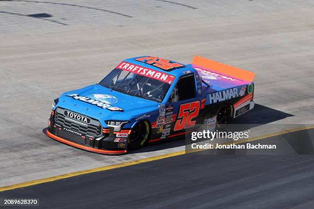 Stewart Friesen, driver of the Halmar International Toyota, drives during qualifying for the NASCAR Craftsman Truck Series Weather Guard Truck Race...