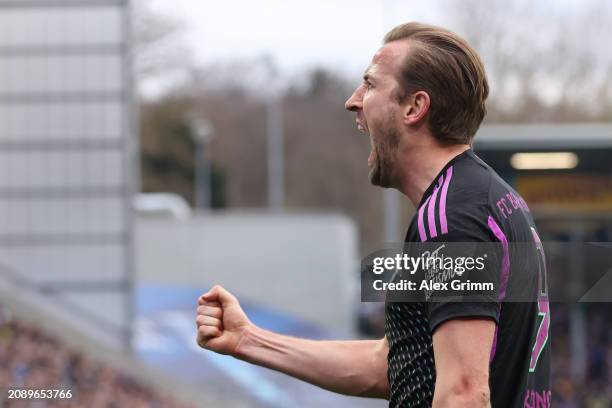 Harry Kane of Bayern Muenchen celebrates the team's second goal during the Bundesliga match between SV Darmstadt 98 and FC Bayern München at...