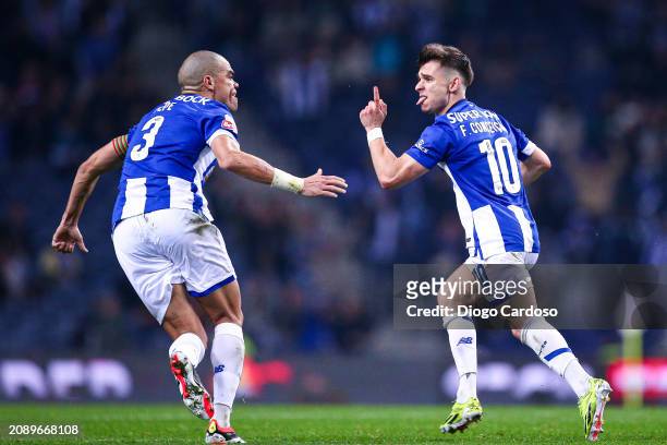 Francisco Conceicao of FC Porto celebrates with Pepe of FC Porto after scoring his team's first goal during the Liga Portugal Bwin match between FC...