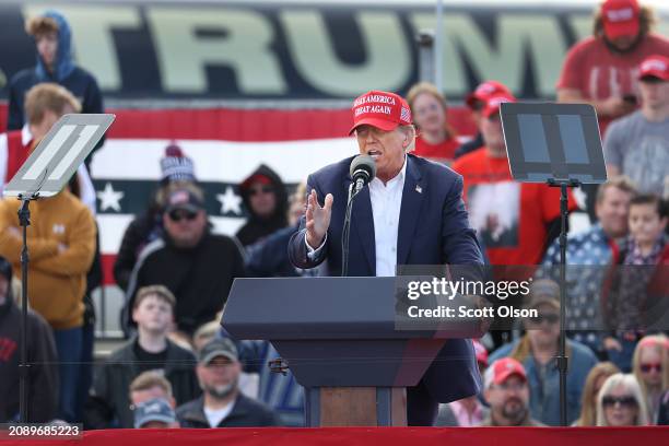 Republican presidential candidate former President Donald Trump speaks to supporters during a rally at the Dayton International Airport on March 16,...