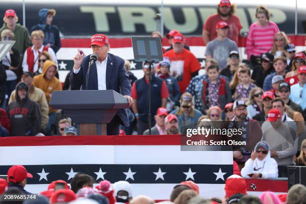 Republican presidential candidate former President Donald Trump speaks to supporters during a rally at the Dayton International Airport on March 16,...