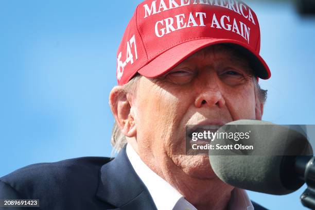 Republican presidential candidate former President Donald Trump speaks to supporters during a rally at the Dayton International Airport on March 16,...