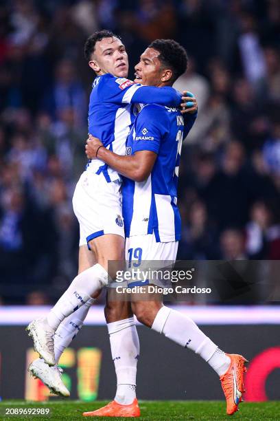 Pepe of FC Porto celebrates with Danny Namaso of FC Porto after scoring his team's second goal during the Liga Portugal Bwin match between FC Porto...