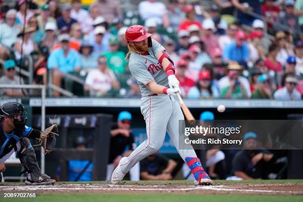 William Simoneit of the Philadelphia Phillies at bat during a spring training game against the Miami Marlins at Roger Dean Stadium on March 16, 2024...