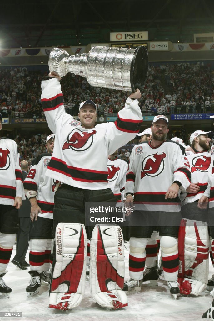 Brodeur holds up the Cup