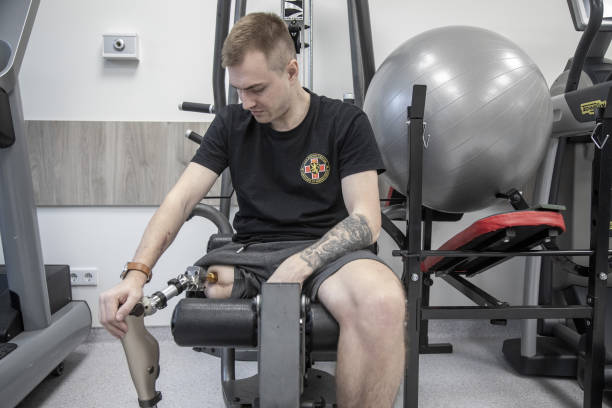 Alexander, a 36-years-old war veteran attends physiotherapy training at Center for Complex Endoprosthesis, Osseointegration and Bionics, as he...