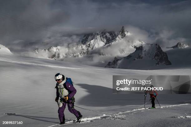 French mountaineer Charles Dubouloz and French skipper Jeremie Beyou climb the Glacier Du Geant near the Aiguille du Midi, in the Mont Blanc Massif...