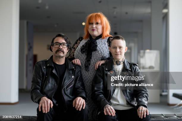 March 2024, Berlin: The members of the band Gossip, Nathan Howdeshell , Beth Ditto and Hannah Blilie sit in the Neue Nationalgalerie. Almost twelve...