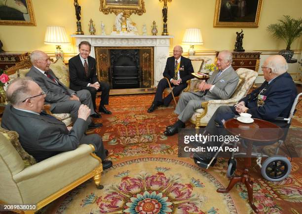 King Charles III , along with Master of The King's Household, Vice Admiral Sir Tony Johnstone-Burt during an audience with Veterans of the Korean War...