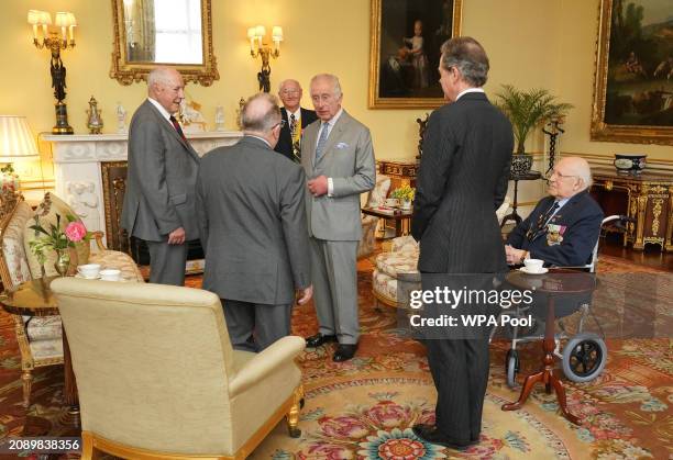 King Charles III , along with Master of The King's Household, Vice Admiral Sir Tony Johnstone-Burt during an audience with Veterans of the Korean War...