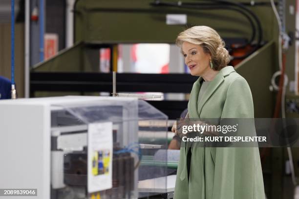 Queen Mathilde of Belgium is pictured during a royal visit to Aarova, a custom company that produces textiles and sells pasta dishes in Oudenaarde,...