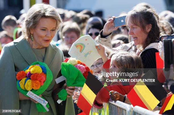 Queen Mathilde of Belgium is pictured during a royal visit in Oudenaarde on March 19 as part of a visit to the province of East Flanders. / Belgium...