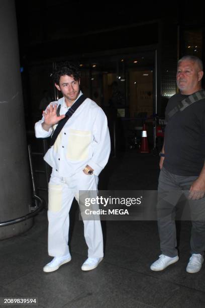 Nick Jonas is seen arriving at Mumbai airport on March 19, 2024 in Mumbai, India.