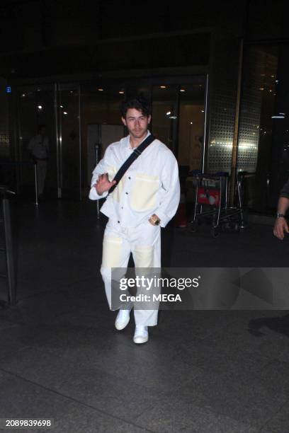 Nick Jonas is seen arriving at Mumbai airport on March 19, 2024 in Mumbai, India.