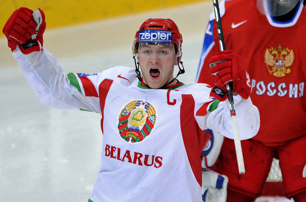Belarus Konstantin Koltsov celebrates his team's first goal in front of Russian goalkeeper Ilya Bryzgalov during their quarter-final game at the 2009...