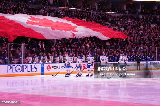 Canadian Anthem Sung in Both Languages at Buffalo Game Canadian Anthem Sung in Both Languages at Buffalo Game