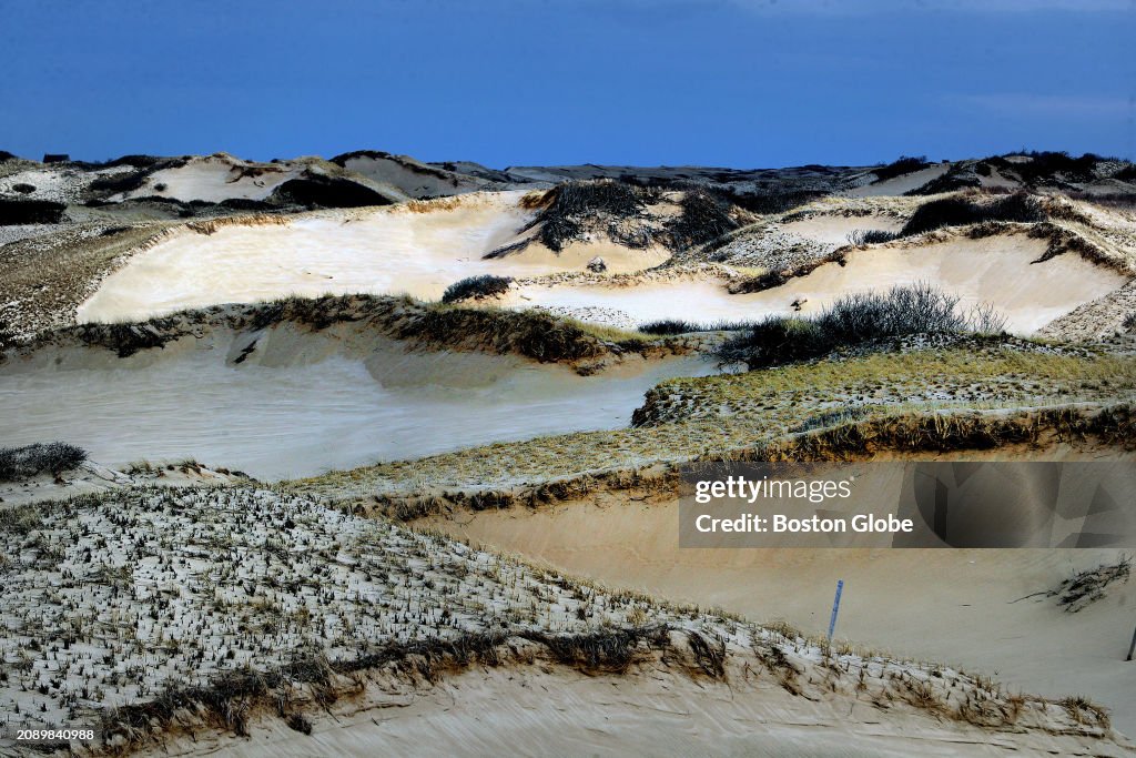 Storm clouds loom over the Race Point Dunes where the Lady of the ...