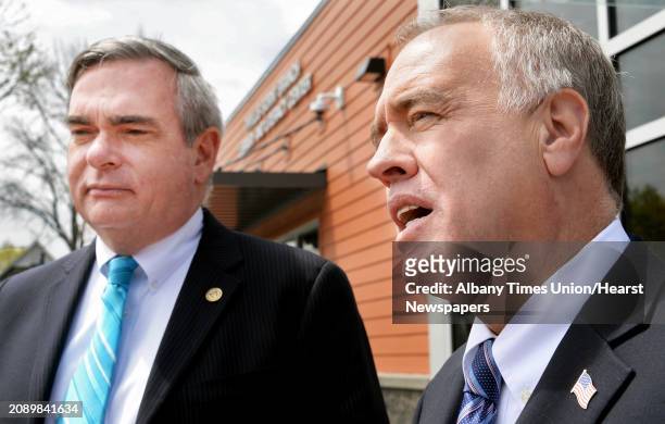 Mayor Gary McCarthy, left, and NYS Comptroller Thomas DiNapoli, left, speak with reporters following a tour of the newly opened Phyllis Bornt Branch...