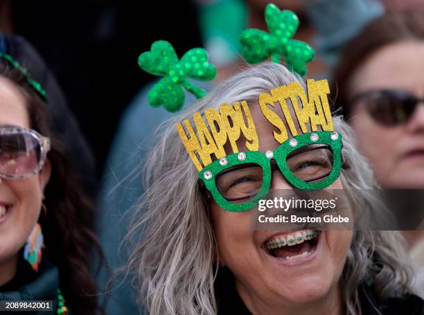 Boston, MA A woman laughed during the annual St. Patrick's day parade.