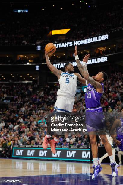 Anthony Edwards of the Minnesota Timberwolves dunks the ball against the Utah Jazz on March 18, 2024 at Delta Center in Salt Lake City, Utah. NOTE TO...