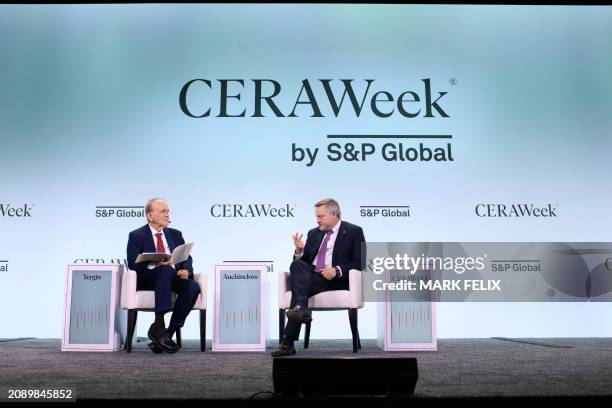 Of BP Murray Auchincloss speaks with with Vice Chairman of S&P Global Daniel Yergin, during the CERAWeek oil summit in Houston, Texas, on March 19,...