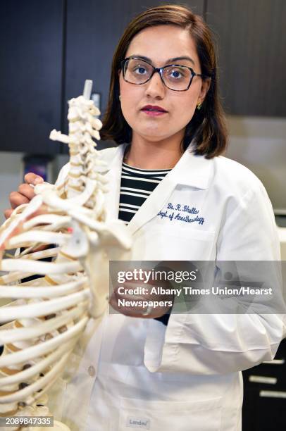 Dr. Ravneet Bhullar, anesthesiologist, and director of the Division of Chronic Pain Management at Albany Med's Comprehensive Spine Center Tuesday...