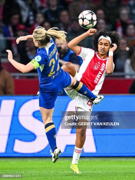 Chelsea's Erin Cuthbert vies with Ajax's Lily Yohannes during the UEFA women's Champions League quarter-final match between Ajax Amsterdam and...