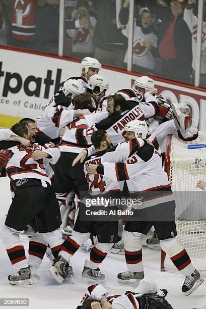 The New Jersey Devils celebrate after defeating the Mighty Ducks of Anaheim 3-0 in game seven of the 2003 Stanley Cup Finals at Continental Airlines...