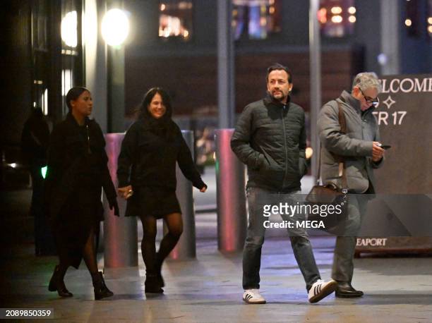 Marilee Fiebig and Andrew Shue are seen walking home after having dinner at ' The Fulton' on March 1, 2024 in New York, New York.