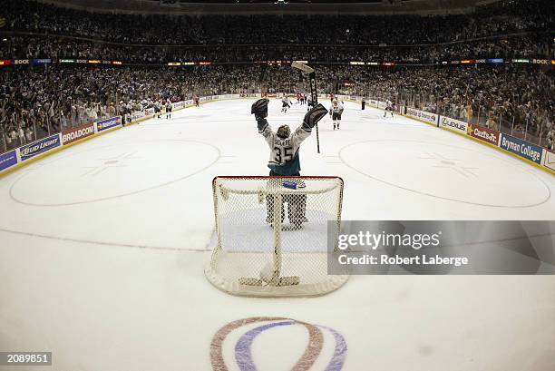 Jean-Sebastien Giguere of the Mighty Ducks of Anaheim celebrates after a victory over the New Jersey Devils in game six of the 2003 Stanley Cup...