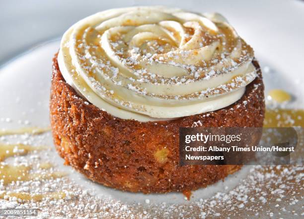 Carrot cake with orange cream cheese frosting at The Cock 'n Bull restaurant Thursday March 8, 2018 in Galway, NY.