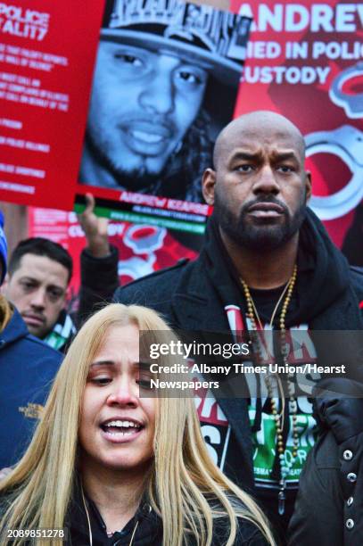 Angelique Negroni-Kearse, left, whose husband died in police custody and Hawk Newsome of Black Lives Matter Greater New York join supporters outside...
