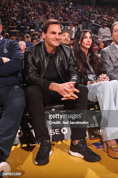 Roger Federer and Nicole Curran attend the game between the San Antonio Spurs and the Golden State Warriors on March 9, 2024 at Chase Center in San...