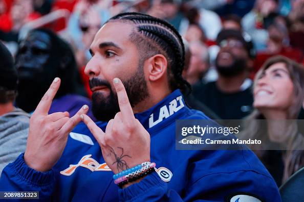Fire 16 Rapper Rapper, songwriter, and icon Drake attends a game between the Houston ...