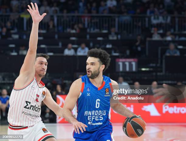 Elijah Bryant of Anadolu Efes in action against Giannoulis Larentzakis of Olympiakos during the Turkish Airlines Euroleague 30th week match between...