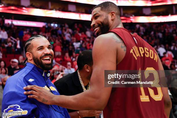 Rapper, songwriter, and icon Drake speaks with Tristan Thompson of the Cleveland Cavaliers following a game against the Houston Rockets at Toyota...