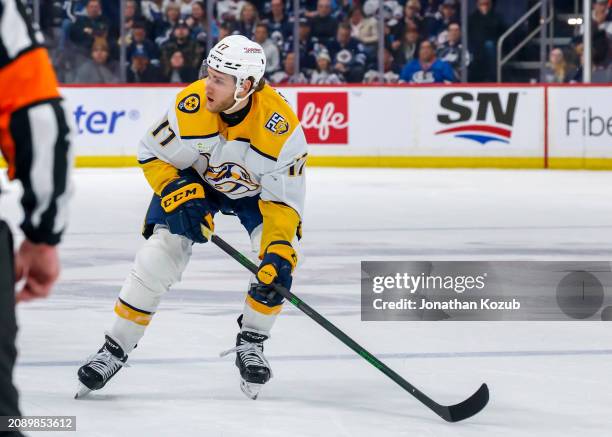 Mark Jankowski of the Nashville Predators skates during first period action against the Winnipeg Jets at Canada Life Centre on March 13, 2024 in...