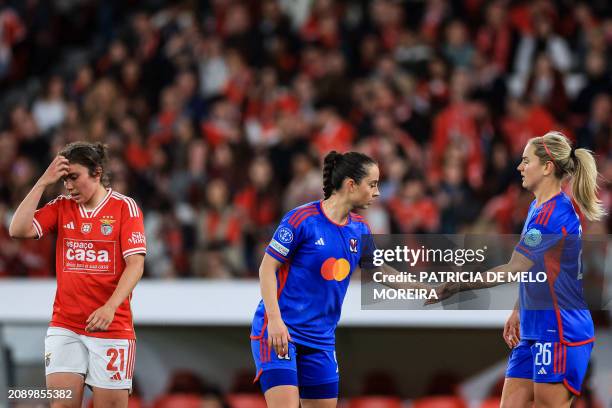 Lyon's German midfielder Sara Dabritz celebrates victory with Lyon's US midfielder Lindsey Horan at the end of the UEFA Women's Champions League...